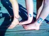 glitter fish tattoo on ankle